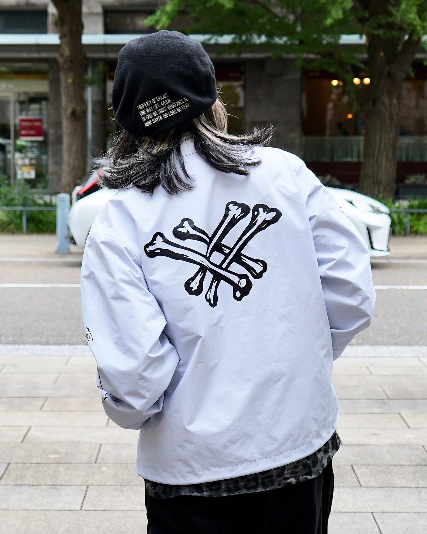 EVILACT CROSS BONE WIND BREAKER white