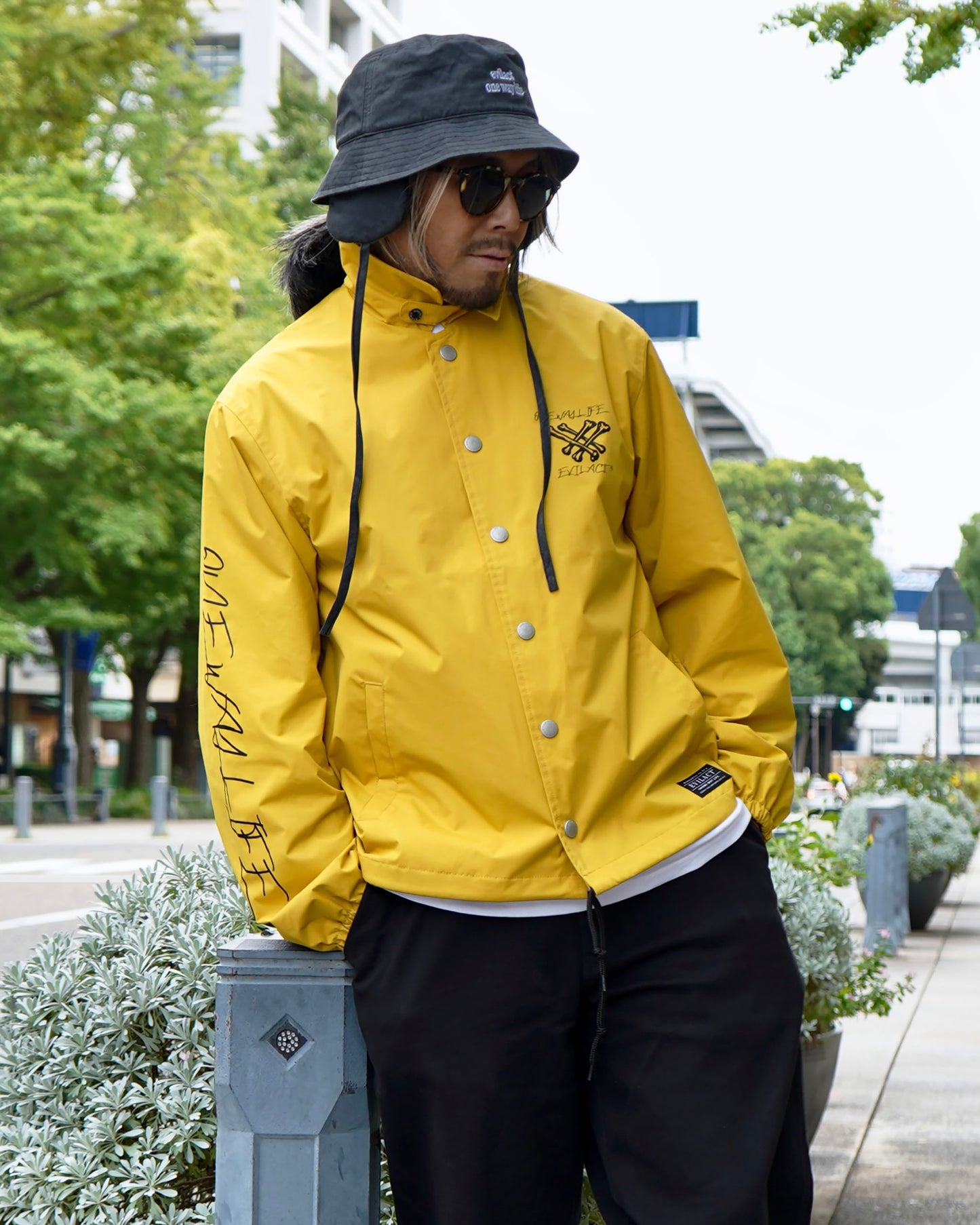 EVILACT CROSS BONE WIND BREAKER mustard