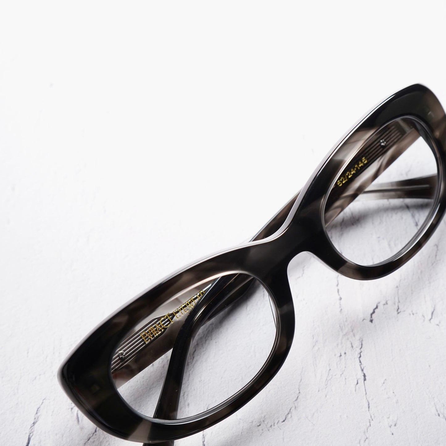 SPIRAL black marble / color photochromic blue lens