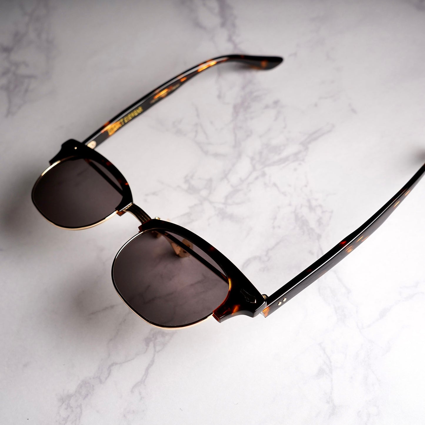 ORIENT black x a.clear x gold / green lens