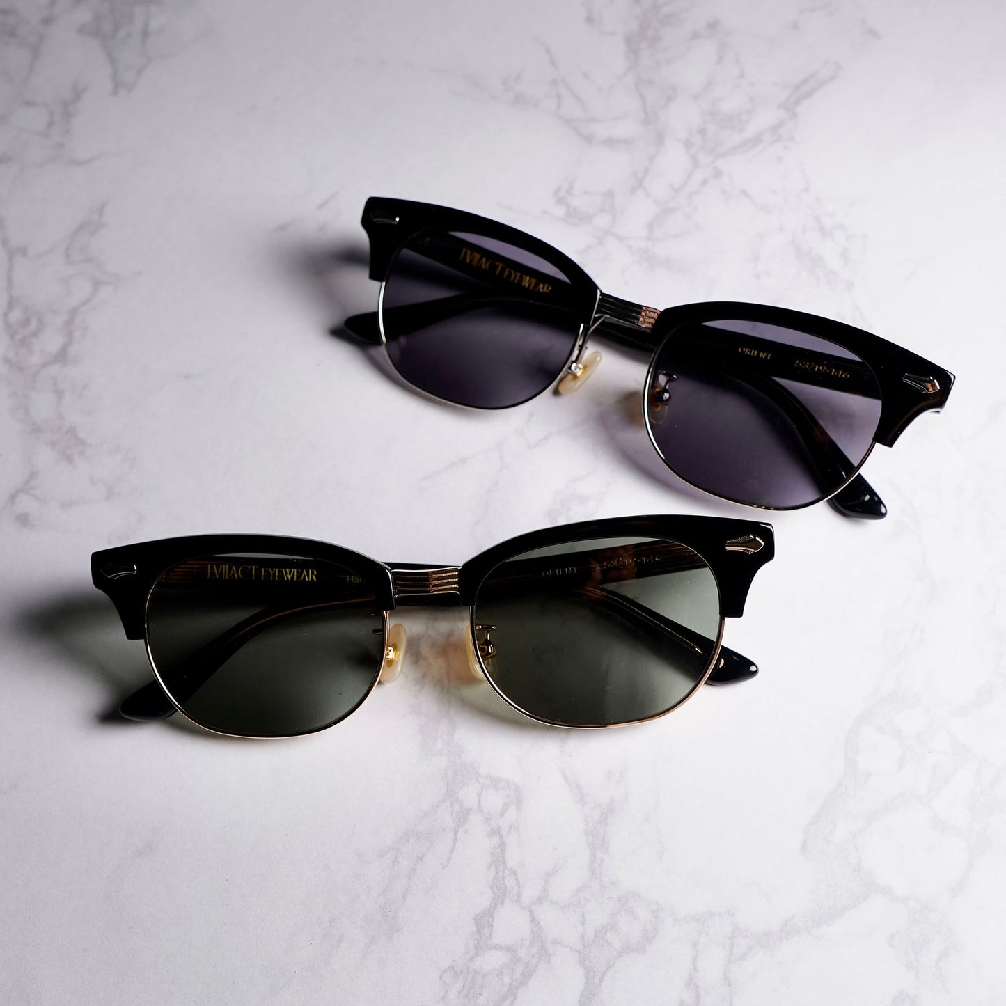 ORIENT black x a.clear x gold / green lens